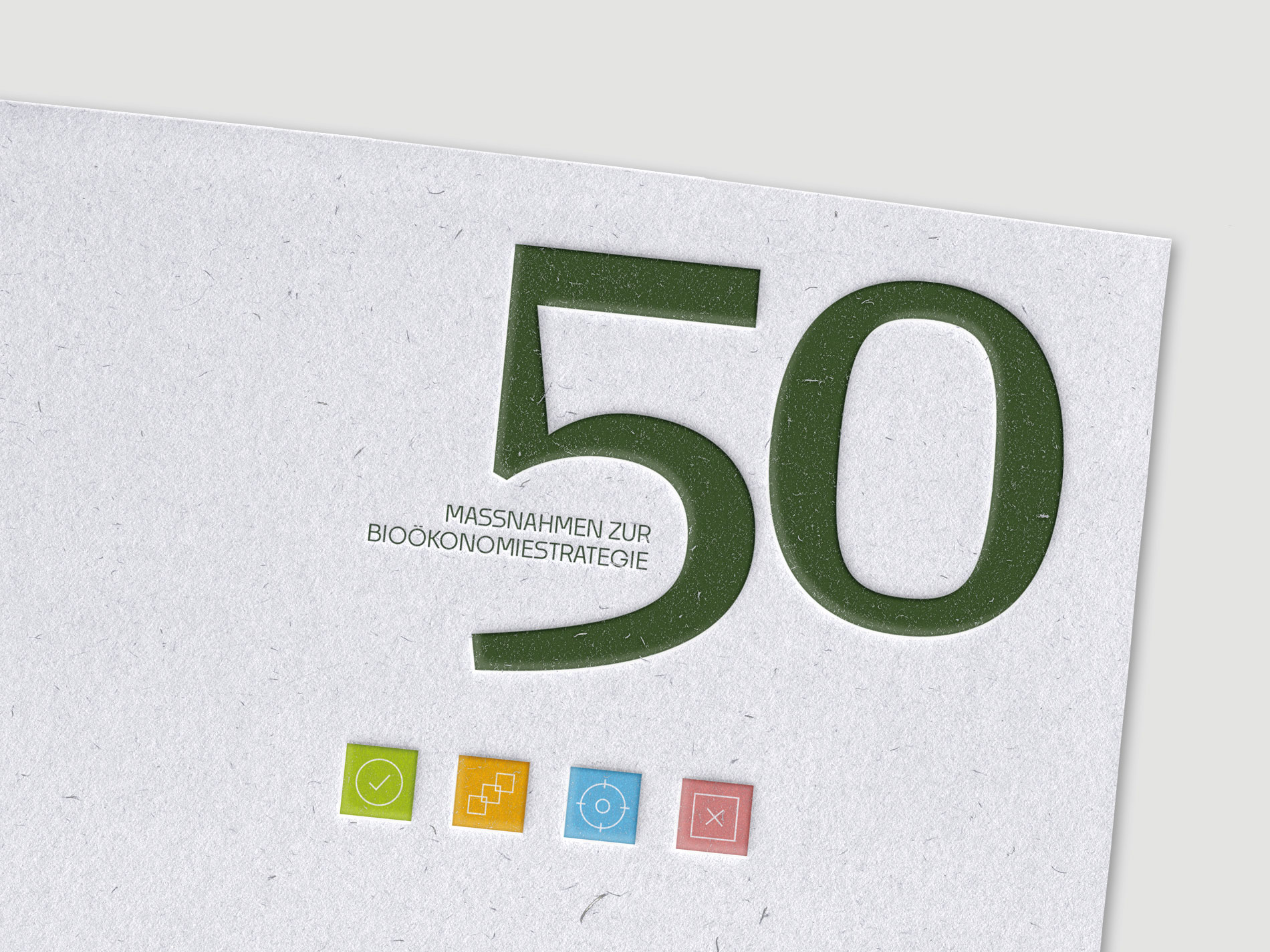 Das Bild zeigt eine grafische Darstellung mit der großen Zahl "50" in grün und dem Text "Maßnahmen zur Bioökonomiestrategie" darunter, begleitet von vier farbigen Symbolen am unteren Rand.