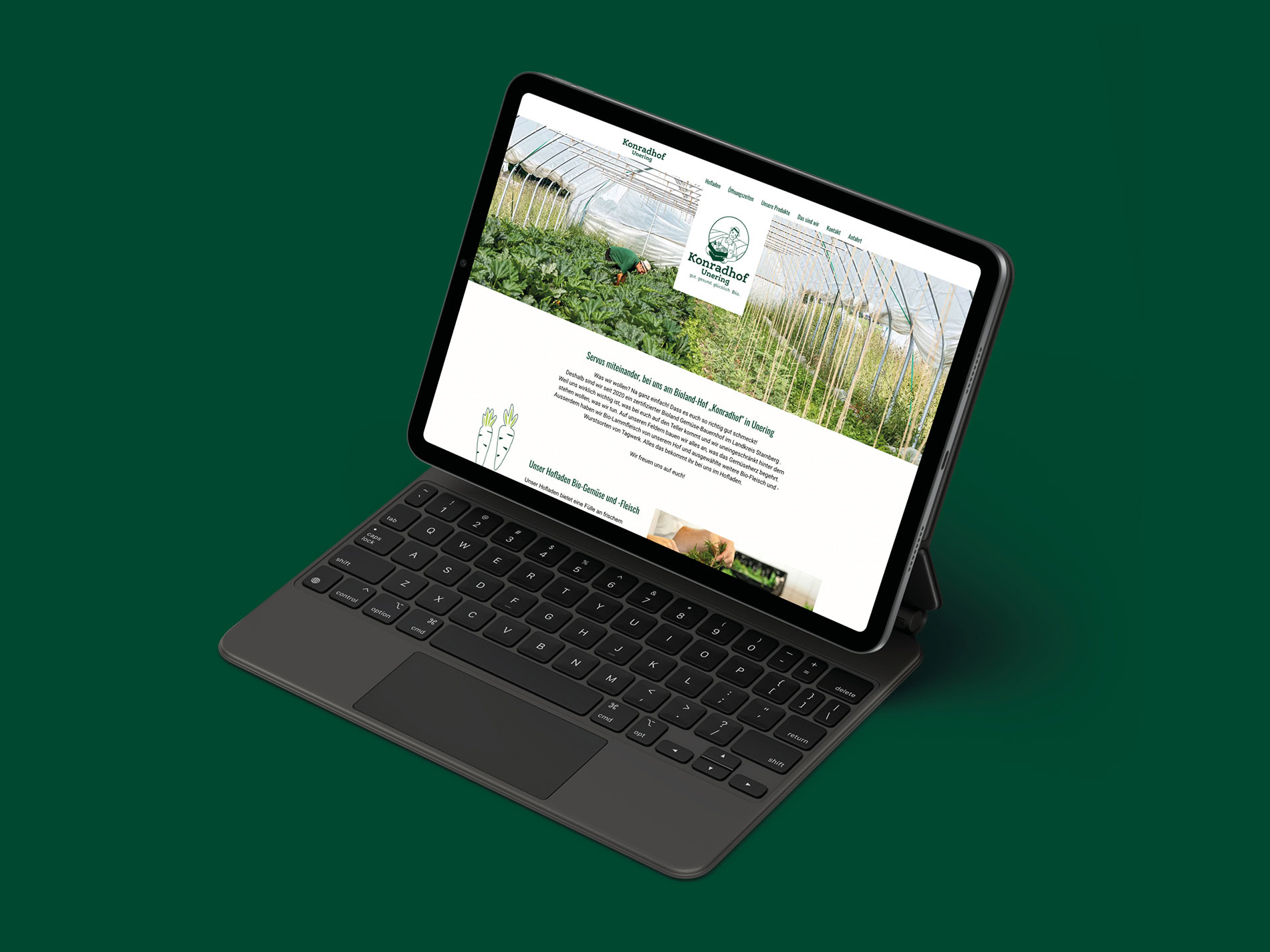 Bild eines aufgeschlagenen MacBooks zur Ansicht der Konradhof-Website.